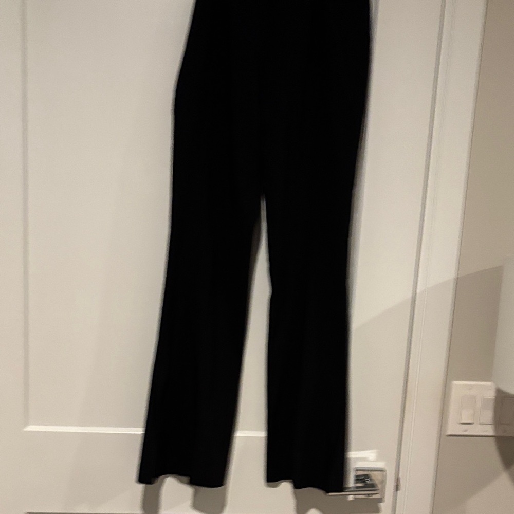 Insight black pants modified wide leg with a slit on bottom